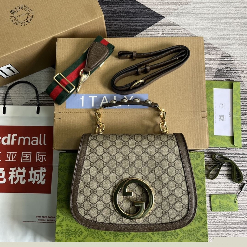 G*u*i top handle bags
